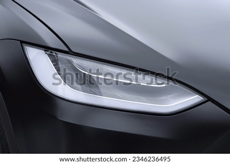 headlight of a modern prestigious car close-up Royalty-Free Stock Photo #2346236495