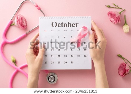 Show your support during International Breast Cancer Awareness Month. Top view picture with hands, calendar, and pink ribbon on pastel pink isolated background, suitable for text or advertising