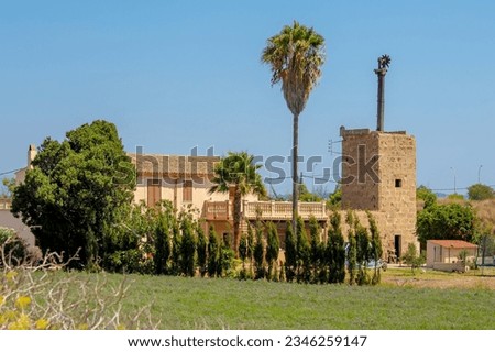 Old ruined farm buildings in southern Spain. Ruined houses, where people still live, with ruined mills,  
