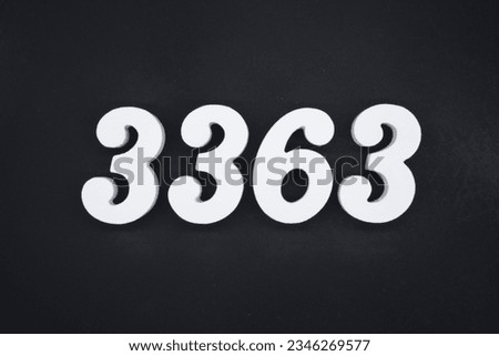 Black for the background. The number 3363 is made of white painted wood.