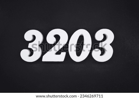 Black for the background. The number 3203 is made of white painted wood.