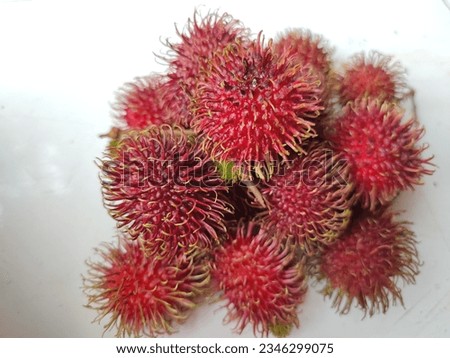 Rambutan isolated on white background. Fresh and ripe rambutan sweet tropical fruit. 
