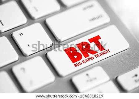 BRT - Bus Rapid Transit is a bus-based public transport system designed to have better capacity and reliability than a conventional bus system, acronym text button on keyboard Royalty-Free Stock Photo #2346318219