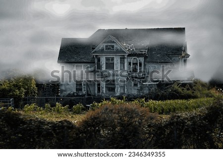 A haunted house surrounded by fog and a corn field  Royalty-Free Stock Photo #2346349355