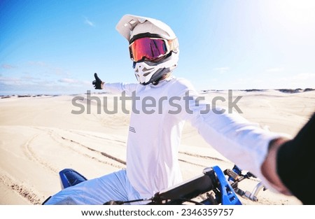 Selfie, motorcycle and man in desert adventure, nature and sports outdoor on mockup space. Bike, helmet and person take picture at sand for social media, transportation and off road travel in Morocco