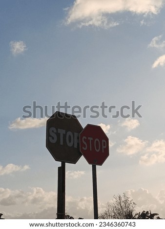 stop sign with sunshine background 