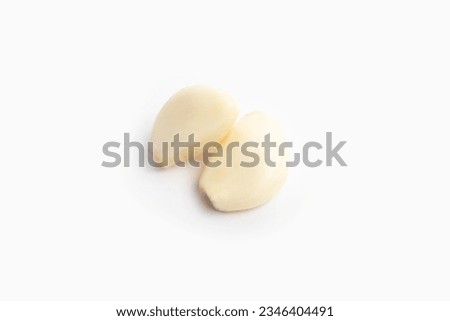 peeled garlic isolated on white background
