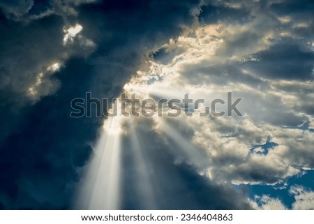 Cumulonimbus cloud dark sky storm clouds, bad weather scary natural in the sky with sunbeams no stitched image Royalty-Free Stock Photo #2346404863