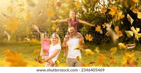 Picture of lovely family in autumn park, young parents with nice adorable kids playing outdoors, five cheerful person have fun on backyard in fall, happy family enjoy autumnal nature