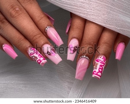 Set beautiful nails with trendy pink barbiecore design manicure
 Royalty-Free Stock Photo #2346416409