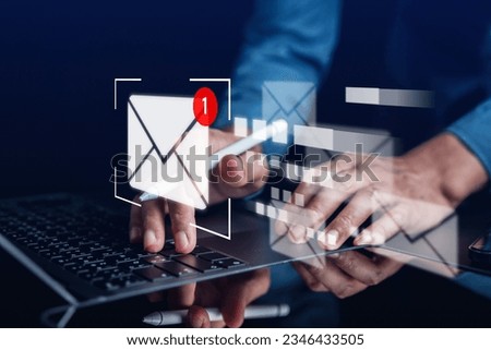 Businessman sending email by laptop computer to customer, business contact and communication, email icon, email marketing concept Royalty-Free Stock Photo #2346433505