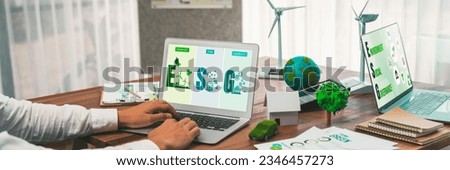 Go green for environmental awareness concept display on laptop on eco-friendly company meeting with businessman initiate environmental protection for clean and sustainable future ecology. Trailblazing