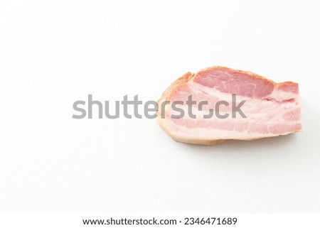 Block bacon on white background.