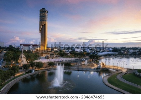 Aerial View  Roi et tower or Vote Tower 101 and  Bung Plan Chai  This park in the middle of Roi Et's lake in the city center in sunset time,Province Roi Et Thailand. Royalty-Free Stock Photo #2346474655