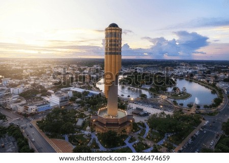 Aerial View  Roi et tower or Vote Tower 101 and  Bung Plan Chai  This park in the middle of Roi Et's lake in the city center in sunset time,Province Roi Et Thailand. Royalty-Free Stock Photo #2346474659