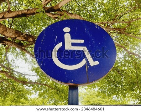 handicapped sign, Handicapped sign under the tree