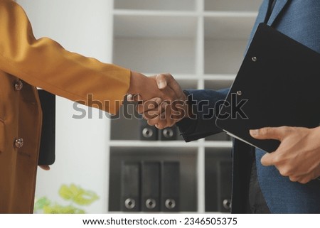 Business woman offer and give hand for handshake in office. Successful job interview. Apply for loan in bank. Salesman, bank worker or lawyer shake for deal, agreement or sale. Increase of salary. Royalty-Free Stock Photo #2346505375