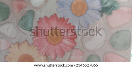 Three-dimensional embossed ceramic tile paint drawing, patterns of yellow, red and light blue flowers, beside the flowers there are white, green, pink three-dimensional embossed stones.