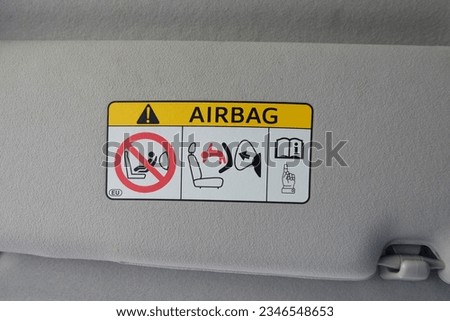 Instructions on how to use the safety airbag in a car Royalty-Free Stock Photo #2346548653