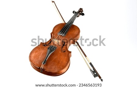 Violin: A bowed string instrument producing sweet, high-pitched tones, often used in classical and folk music. Royalty-Free Stock Photo #2346563193