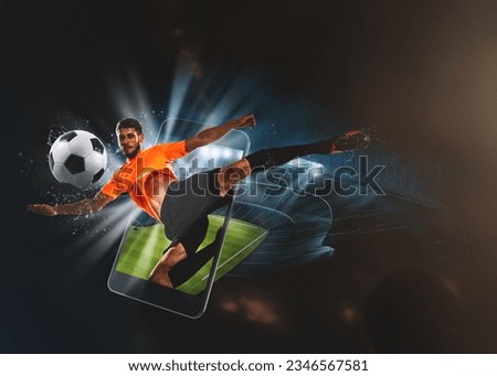 Watch a live sports event on your mobile device. Betting on football matches Royalty-Free Stock Photo #2346567581