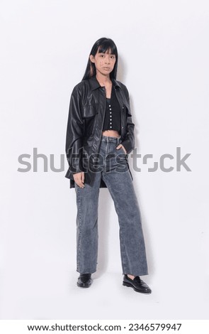 full length of young woman poising ,Indoor studio shot on white background