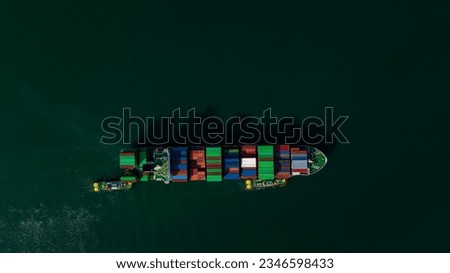 top view light and shadow of cargo container ship sailing in sea to import export goods and distributing products to dealer and consumers worldwide, by container ship Transport business delivery 