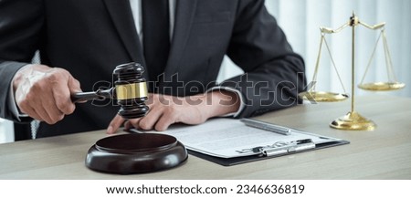Male lawyer working with legal case document contract in office. Royalty-Free Stock Photo #2346636819
