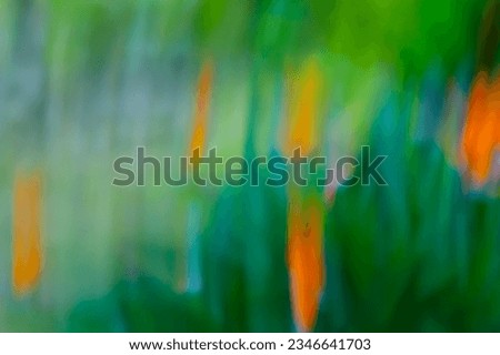 Wild colorful tropical flowers, orange and green in the rainforest garden, national park, abstract background, vivid colours, creative movement, picture in motion