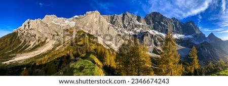 Panorama of the mountain range in autumn. Autumn mountain panoramic landscape. Autumn mountain panorama. Beautiful mountain panorama Royalty-Free Stock Photo #2346674243