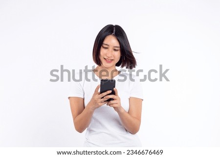 Young woman of asian smiling face beautiful holding smartphone and smiling with typing on mobile, isolated on white background.