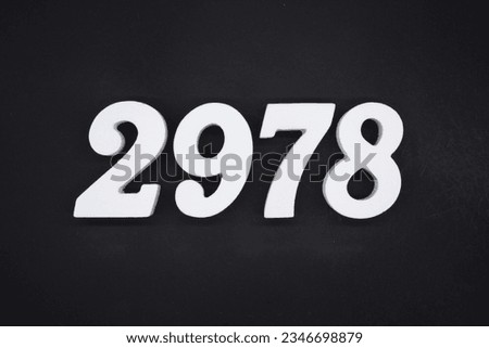 Black for the background. The number 2978 is made of white painted wood.