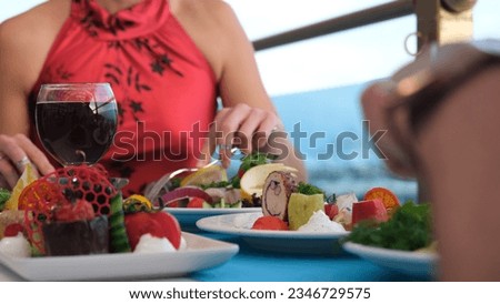 a woman a man having dinner at a luxury restaurant