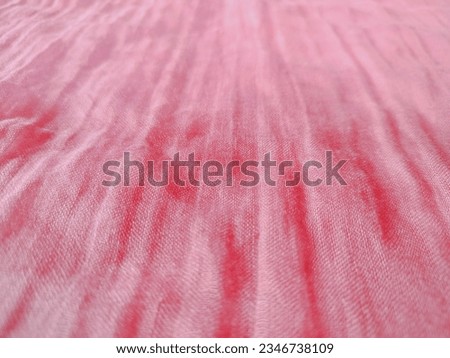 Pink fabric background, soft, faded, easy on the eyes, suitable for placing products or products, ads, cute, cosmetics, feminine beauty and there is space for text description

