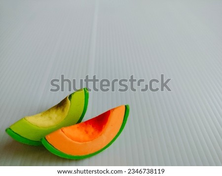picture of cantaloupe, toy, yellow, green peel Used as a background illustration to describe the benefits of watermelon. yellow fruit green health lovers food fruit juice drink eating whole food
