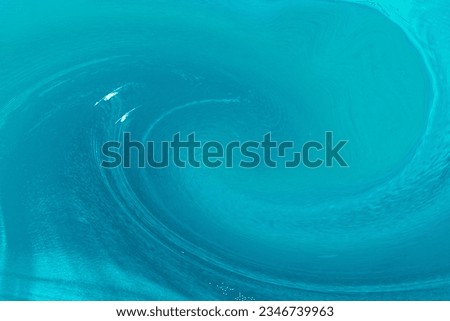 spiral waves of greenish-clear water