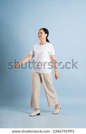 a full body photo of a middle-aged woman