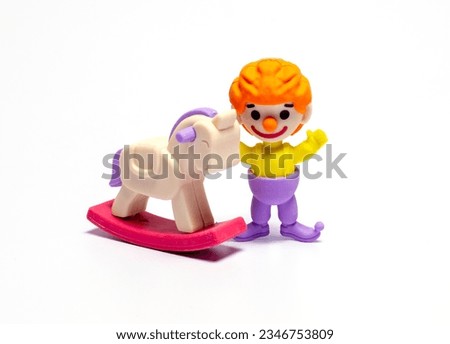 clown toy and rocking horse