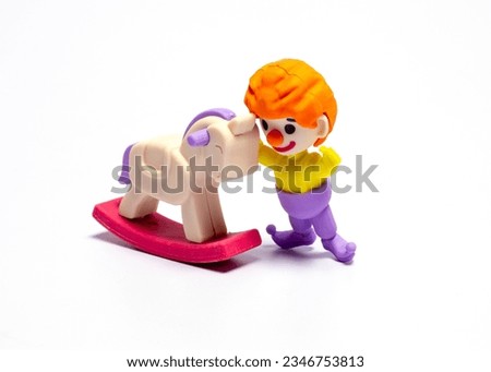 clown toy and rocking horse