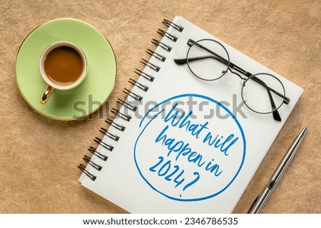 What will happen in 2024 ? Handwriting in a spiral notebook with a cup of coffee. Personal, business and financial trends and expectations in New Year. Royalty-Free Stock Photo #2346786535