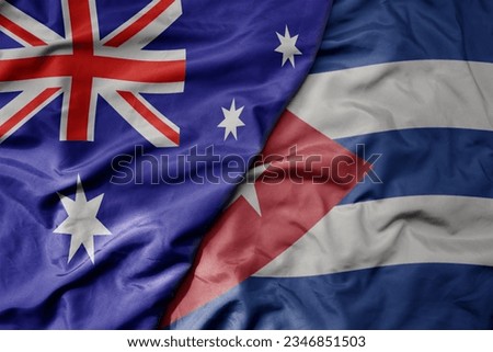 big waving realistic national colorful flag of australia and national flag of cuba . macro