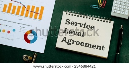There is notebook with the word Service Level Agreement. It is as an eye-catching image.
