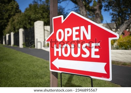 red sign for open house