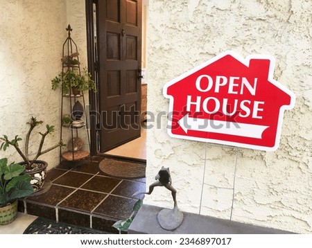open house sign for condominium