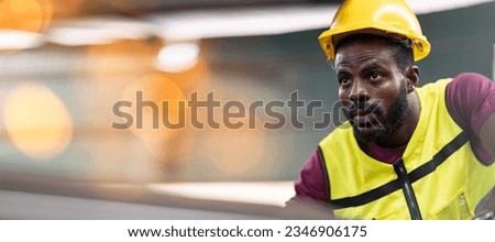 serious African American engineer intend and focus working with machine in industry factory. black labor worker mechanic man strive working . technician concentrated Quality Control . copy space Royalty-Free Stock Photo #2346906175