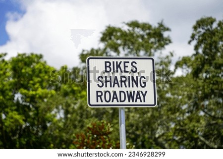 Bikes Sharing Roadway Street Sign.                       