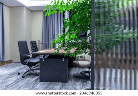 Empty modern office interior with glass partitions Royalty-Free Stock Photo #2346948355