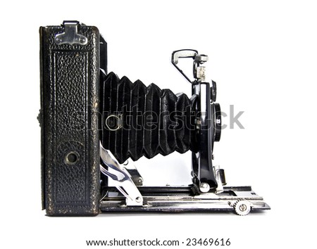 Vintage photo camera isolated on white background