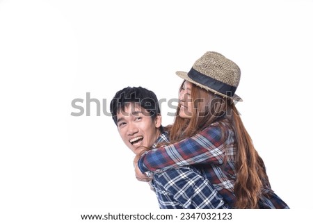 happy young couple in casual wear checkered shirt., hugging on white background