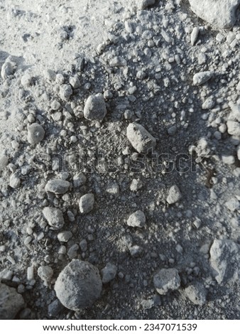 small stones on black sand